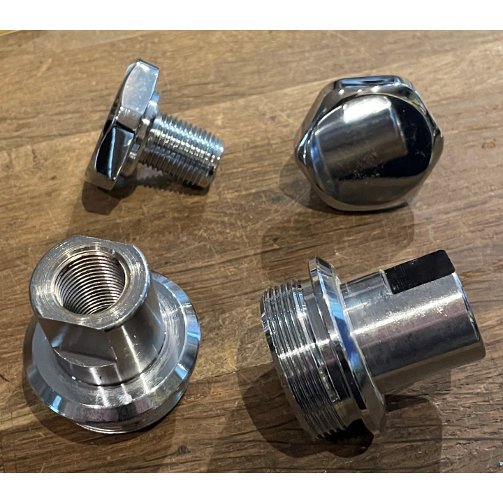 FORK TUBE CAP BOLTS AND PLUG SET.